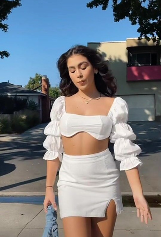 4. Desirable Anahí in White Crop Top in a Street