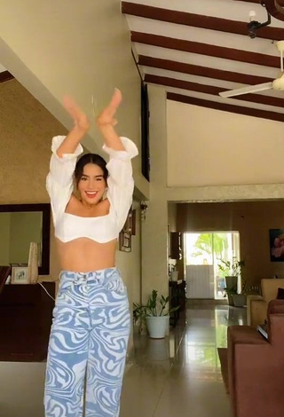 3. Erotic Anahí in White Crop Top