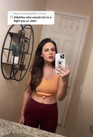 2. Sexy Ashley in Orange Crop Top