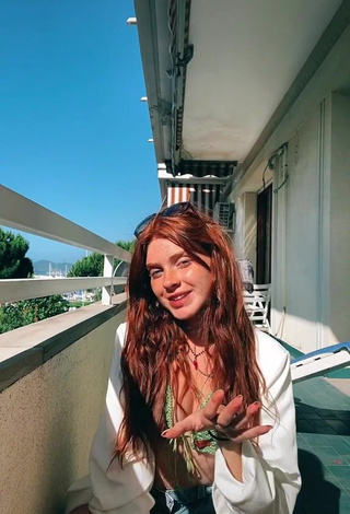 3. Beautiful Aurora Sheaves in Sexy Green Bikini Top on the Balcony