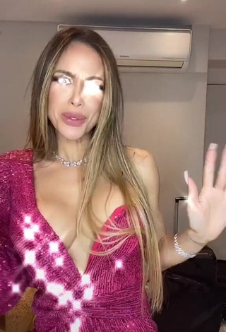 Seductive Késia Muniz de Oliveira Shows Cleavage in Dress