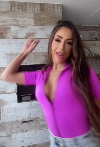 2. Amazing Késia Muniz de Oliveira Shows Cleavage in Hot Violet Top