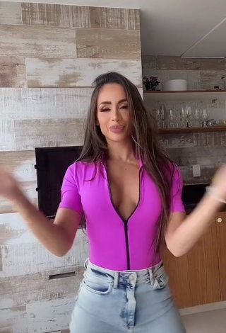 3. Amazing Késia Muniz de Oliveira Shows Cleavage in Hot Violet Top