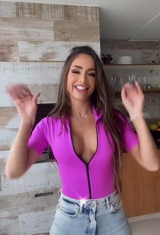 4. Amazing Késia Muniz de Oliveira Shows Cleavage in Hot Violet Top