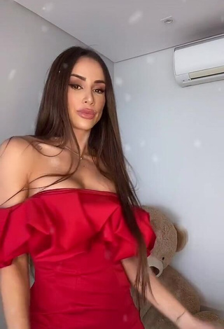 Desirable Késia Muniz de Oliveira Shows Cleavage in Red Dress