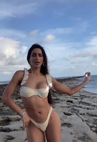 1. Hot Késia Muniz de Oliveira Shows Cleavage in White Bikini at the Beach