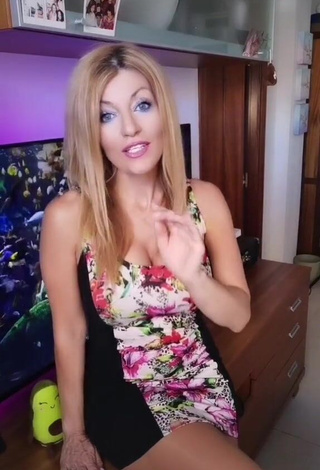 4. Beautiful Lidia Shows Cleavage in Sexy Floral Dress