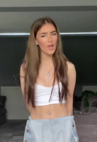 Sexy Emily Steers Shows Cleavage in White Crop Top