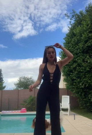 1. Hot EstelleTvo Shows Cleavage in Black Overall at the Swimming Pool