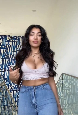 Sexy Jackie Ybarra Shows Cleavage in Grey Top