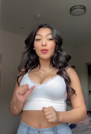 Adorable Jackie Ybarra Shows Cleavage in Seductive White Crop Top