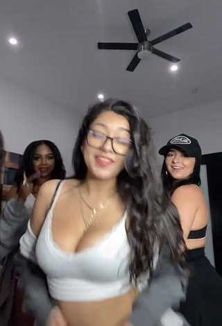 3. Sexy Jackie Ybarra Shows Cleavage in White Crop Top