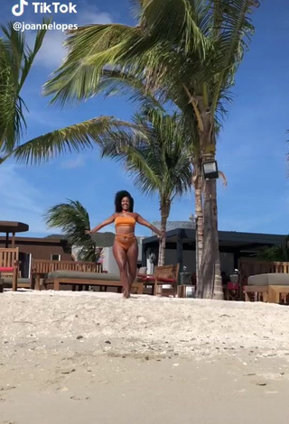 1. Hot Joanne Lopes in Orange Bikini at the Beach