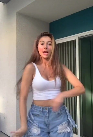 Sexy Isabella Diakomanolis Shows Cleavage in White Crop Top