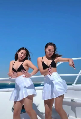 3. Hot Tomiris & Nargiz Kanatova in Black Bikini Top on a Boat