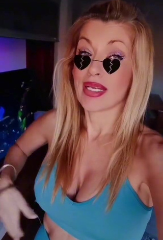 4. Sexy Lidia Shows Cleavage in Blue Crop Top