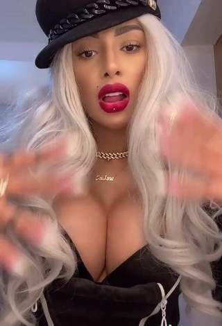 Cristina Pucean Demonstrates Sexy Cleavage and Bouncing Big Boobs