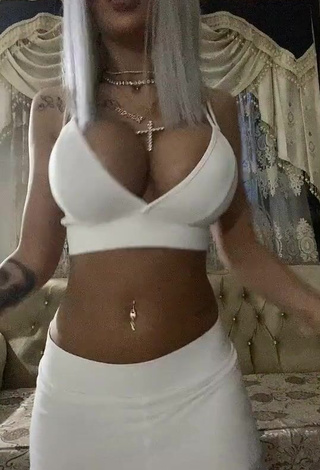 1. Hottie Cristina Pucean Shows Cleavage in White Crop Top