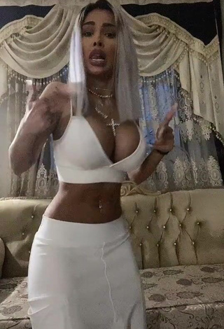 Hottie Cristina Pucean Shows Cleavage in White Crop Top