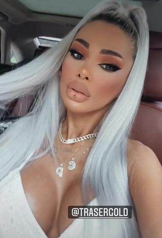 4. Sweetie Cristina Pucean Shows Cleavage in a Car