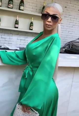 Hot Cristina Pucean Shows Cleavage in Green Dress