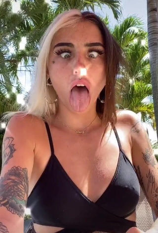 4. Sexy Cruella Morgan in Black Bikini Top