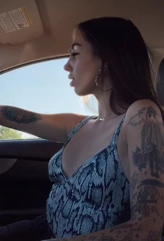 1. Dazzling Cruella Morgan Shows Cleavage in a Car