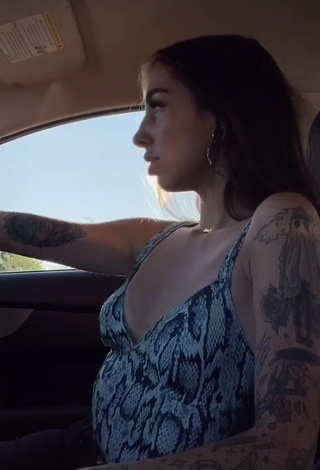 Dazzling Cruella Morgan Shows Cleavage in a Car