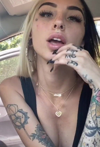 1. Beautiful Cruella Morgan Shows Cleavage in Sexy Black Crop Top in a Car