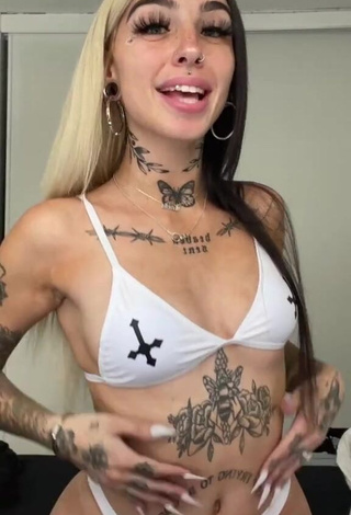 Really Cute Cruella Morgan Shows Cleavage in White Bikini