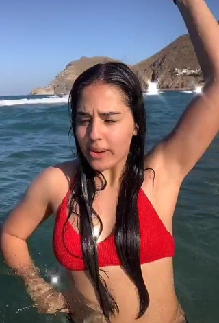 3. Sexy Laura López in Red Bikini Top in the Sea