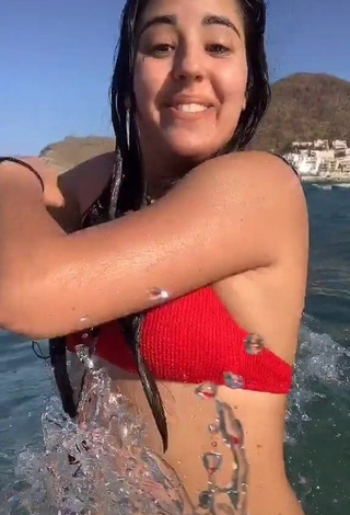 4. Sexy Laura López in Red Bikini Top in the Sea