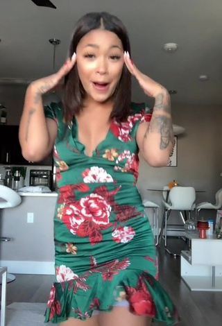 4. Hot Leilani Green in Floral Dress