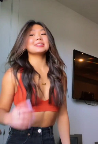 1. Desirable Lily Hirata in Orange Crop Top