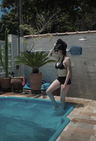 1. Hot Luara Reisinger in Black Bikini at the Swimming Pool