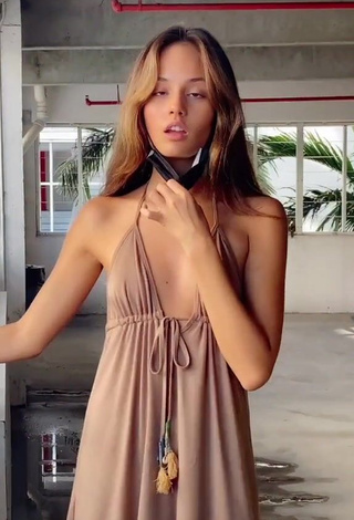 1. Hot Makayla Storms in Beige Sundress