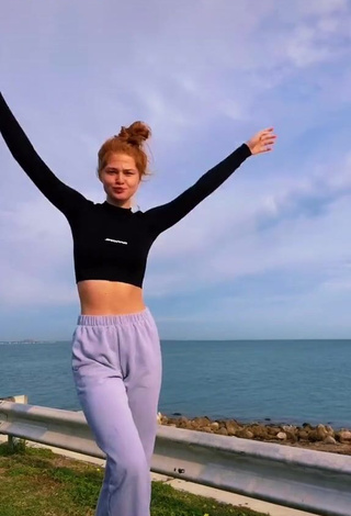 1. Sweetie Alyssa Holum in Black Crop Top in the Sea