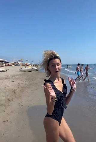 1. Sexy Martina Picardi in Black Swimsuit at the Beach