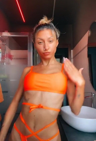 1. Erotic Martina Picardi in Orange Bikini