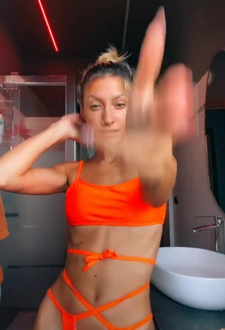 3. Erotic Martina Picardi in Orange Bikini