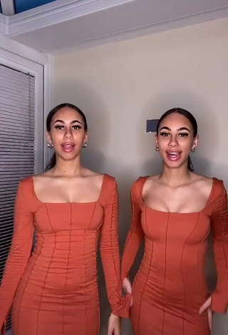 1. Hot Nel.Twinnys in Orange Dress