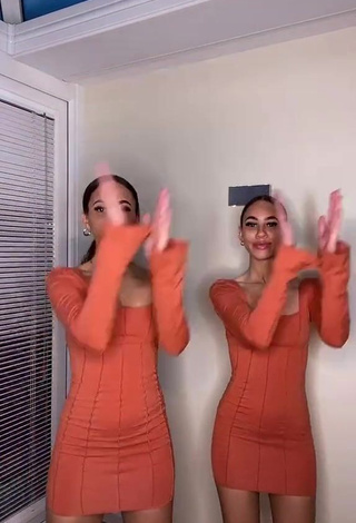 4. Hot Nel.Twinnys in Orange Dress