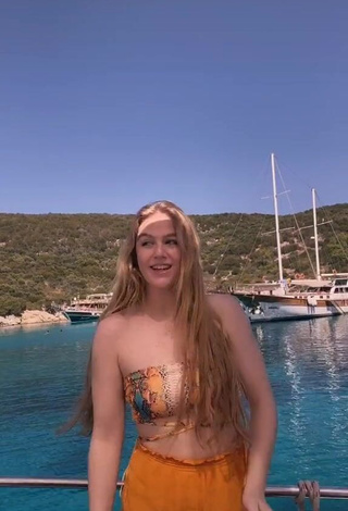 3. Hot Tessa Bear in Snake Print Bikini Top on a Boat