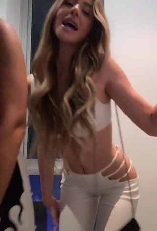 3. Desirable Tori Hubbard in White Crop Top