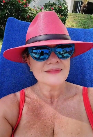 Hot Erika Buenfil Shows Cleavage in Red Swimsuit