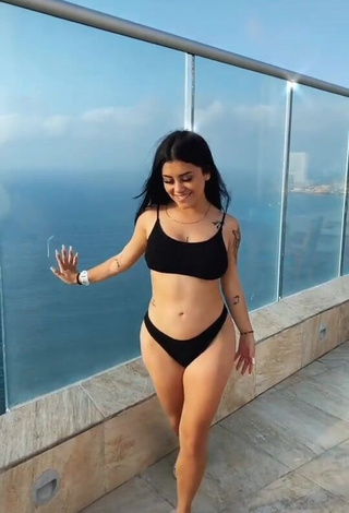 1. Hot Fernanda Ortega in Black Bikini on the Balcony