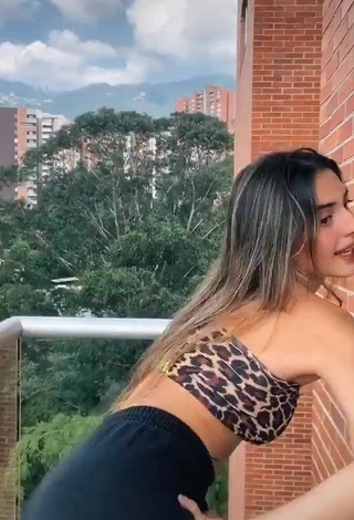 3. Hot Isabela Delgado Urreta in Leopard Tube Top on the Balcony