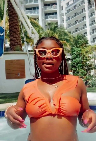 1. Hot Aba Asante in Orange Bikini at the Swimming Pool