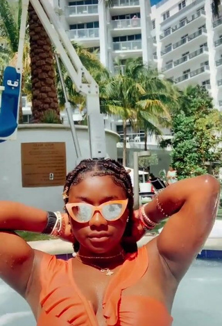 Hot Aba Asante in Orange Bikini at the Swimming Pool