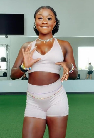 Hot Aba Asante Shows Cleavage in White Sport Bra